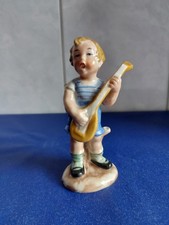 -~Wagner & Apel-~Porzellanfigur-~Porzellanplastik eines kleinen Musikers-~
