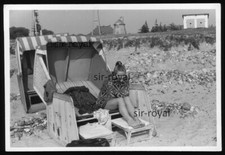 Woman in beach chair - GDR