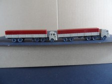 2 LKW mit Pritschen Auflieger