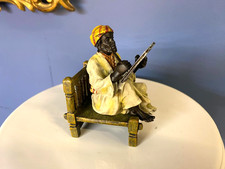 Bronze skulptur writing - of,