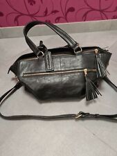 Wickeltasche Leder schwarz Marke Jinger Jack