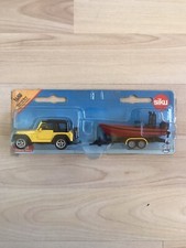 Jeep Wrangler mit Boot