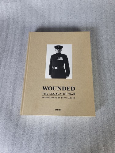 Bryan adams wounded the - adams,