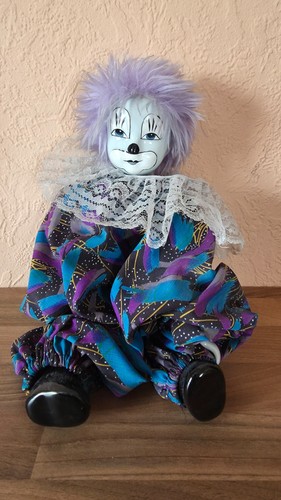 Harlekin puppe sitzend ca - harlekin, sitzend,