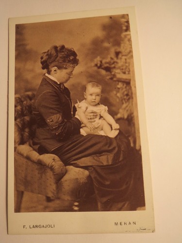 Sitting woman with baby - with, on