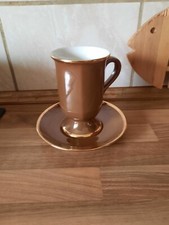 Tasse mit Unterteller von Wellco Krefeld, braun mit Goldrand, s. Fotos