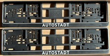 ORIGINAL 2x GEBRAUCHT VW AUTOSTADT KENNZEICHENHALTERUNGEN NUMMERNSCHILDRAHMEN