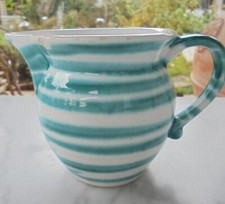 Milchkännchen mit vielen