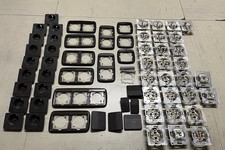 Jung Topline Rahmen + Steckdosen + Wippen braun