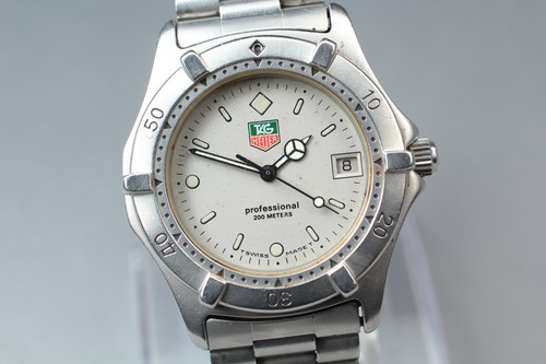 Neuwertig tag heuer - *n, neuwertig*