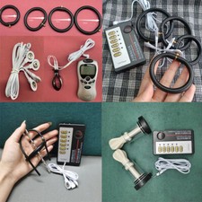 E-Stim Shock Ballstretcher Hodensack Penisplug Penisring Stecker Nippelsauger DE