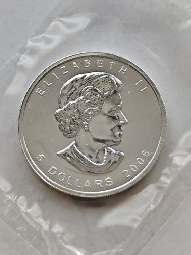 Unze maple leaf dollar - maple,