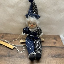 Clown Deko Figur auf Schaukel