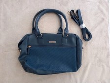 Blaue Handtasche, Neu