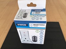 Status Fernbedienungssteckdose, neu im Karton. 