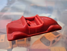 Modellauto in rot mit Lenkrad wahrscheinlich aus Bakelit 50-/60-er Jahre DDR