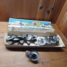 10 sehr alte Kerzenhalter für