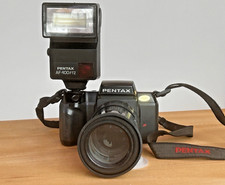 Pentax SF 7 mit SMC Pentax-FA 1:4,5-5,6 -100-300 mm - Pentax AF400FTZ und Gurt