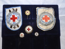 4 Abzeichen + 2 Aufnäher: DDR Bergrettungsdienst des Deutschen Roten Kreuzes
