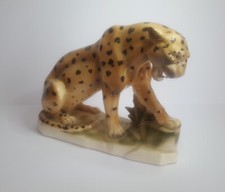 Alte Porzellanfigur sitzender