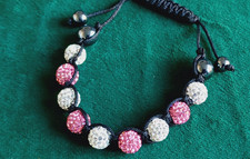 Tresor Paris Armband verstellbar. Rosa & weiße Kristallkugeln Designer Schmuck