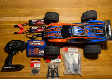 Traxxas Rustler 4x4 VXL brushless 67076-4 + 2 Akkus + Orig. Ladeg. + Ersatzteile