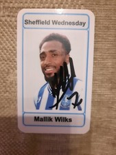 Signierte Mallik Wilks