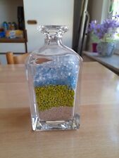 schwere Deko-Flasche mit farbigem Granulat aus Pressglas, Nr. 299