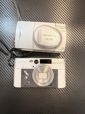 Olympus C-300 Zoom + Canon