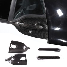 Carbon look door handle trim