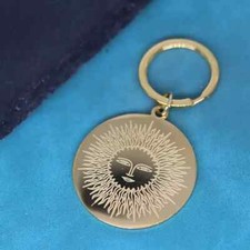 Schlüsselanhänger Sonne gold