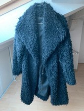 Zottel Fell Mantel, schwarz