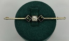 Stabbrosche 40er Jahre 585 Gelbgold Diamant 0,33ct und 2 Princess grüne Steine