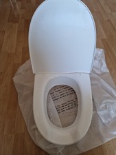 Toilettensitzerhöhung mit Deckel