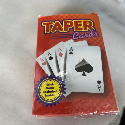 Toy card magic trick - card, taper