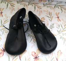 Puppenschuhe für einen Clown