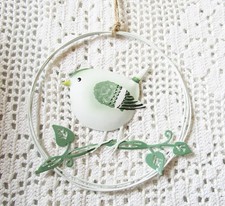 grüner Vogel aus Metall zum