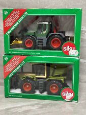 2x SIKU Forstmaschine Schlepper 3857 und 3553 Metall 1:32 Farmer Serie