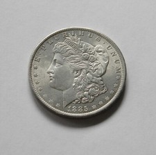 USA: One Dollar 1885 O "MORGAN", prägefrisch/unc., II.