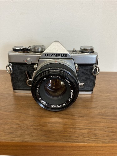 Alte olympus kamera - om, 1