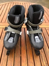  Oxelo Schlittschuhe verstellbar, schwarz weiß & grau, 30-32EU mit Blade-Abdeckungen