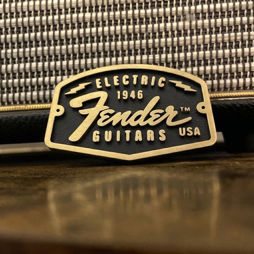 Fender guitar logo badge - logo, gold