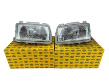 2x Scheinwerfer für VW Polo 6N1 1994-1999 links rechts mechanische LWR - HELLA