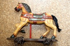 Holzpferd auf Rollen, bemalt, Höhe 41 cm, Länge 44 cm
