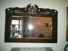 Spiegel mit geschnitztem