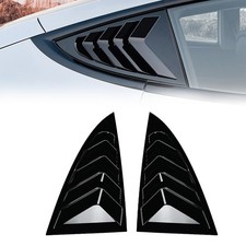 Rear window louver latch cover - rear,