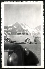 Fotografie Auto Opel Super 6, Limousine vor Gebirgs-Panorama 