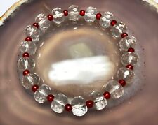 Armband aus Bergkristall in facettierter Radform und Karneol in Kugelform