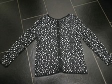 Strickjacke gepunktet