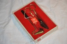 Schere und Kerzen Löscher